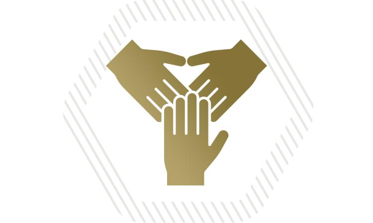 a gold icon of three overlapping hands with a gray hexagon behind it