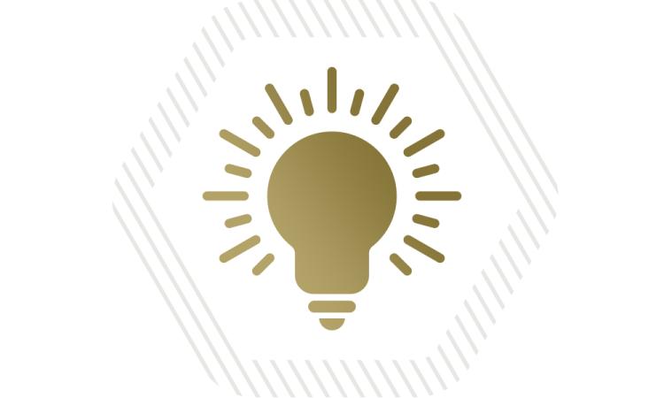 a gold lightbulb icon with a gray hexagon behind it